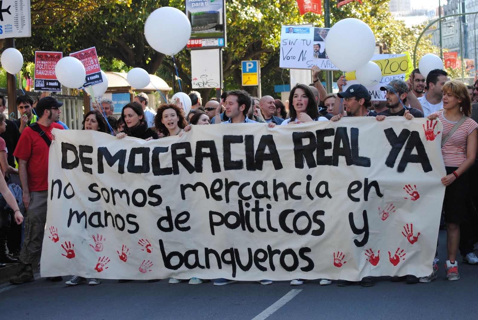 Indignado demonstration: Real Democracy Now - We are not for sale by politicians and bankers