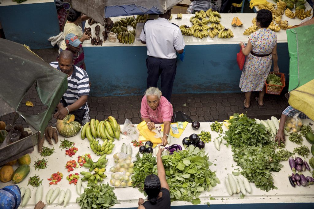 Seychelles - Daily Life - Market Vendors by UN Women via flickr. Under Creative Commons Licence. https://flic.kr/p/WD1B7S